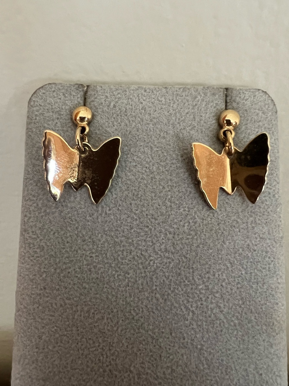 Adorable polished gold butterfly post dangle earrings